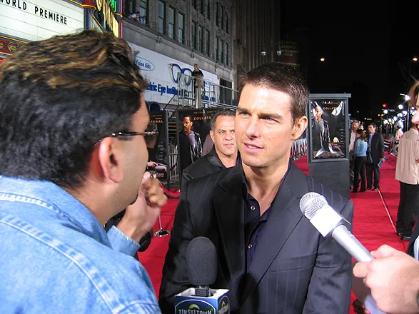 Sheeraz Hasan interviewing Tom Cruise on the red carpet